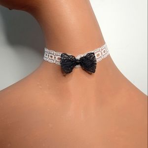 White Lace Choker with Black Lace Bow.